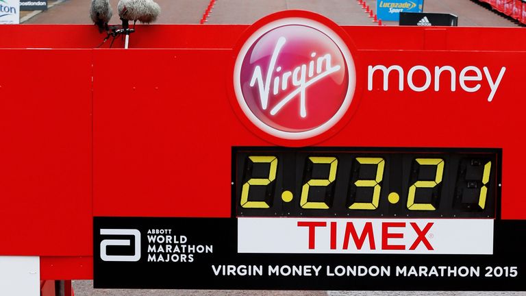 LONDON, ENGLAND - APRIL 26:  Tigist Tufa of Ethiopia crosses the finish line to win the Women's race during the Virgin Money London Marathon on April 26, 2