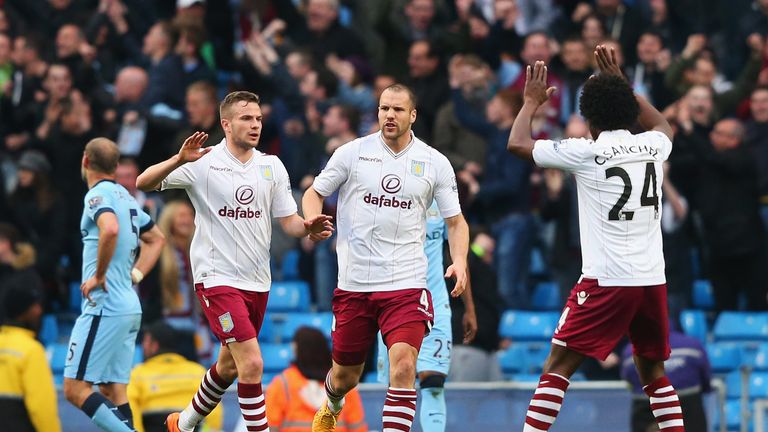 Tom Cleverley celebrates his goal with Ron Vlaar and Carlos Sanchez during the Barclays Premier League match between Manchester City and Aston Villa