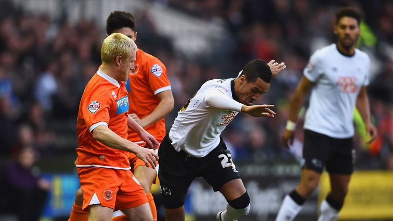 Tom Ince tries to find space