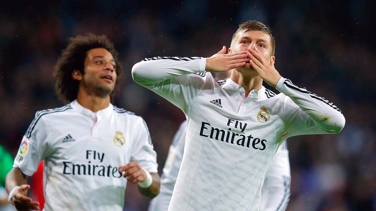 Toni Kroos of Real Madrid CF celebrates scoring their third goal during the La Liga match between Real Madrid CF and Rayo Vallecano
