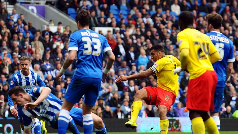 Watford's Troy Deeney scores the first goal of the game during the Sky Bet Championship match at the AMEX Stadium, Brighton.