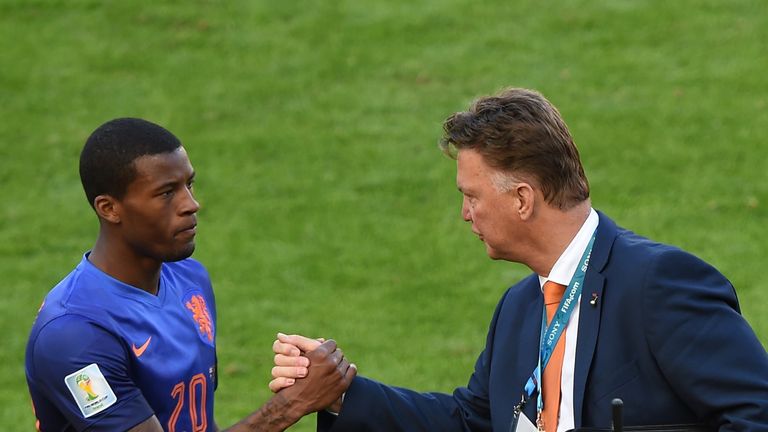 Georginio Wijnaldum is congratulated by Louis van Gaal after World Cup win over Australia