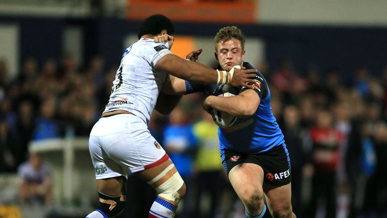 Wakefield Wildcats' Lopini Paea (left) tackles St Helens' Greg Richards