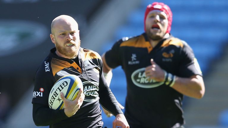 Joe Simpson of Wasps breaks clear to score a last minute try during the Aviva Premiership match between Wasps and Exeter