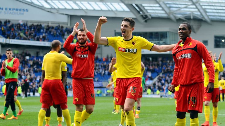 Watford players Watford's Gabriele Angella (left), Craig Cathcart (centre) and Odion Ighalo (right) celebrates with the fans