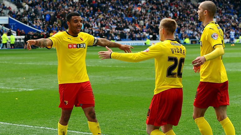 Watford's Matej Vydra (centre) is congratulated Troy Deeney (left) after scoring his sides second goal of the game during the Sky Bet Championship match