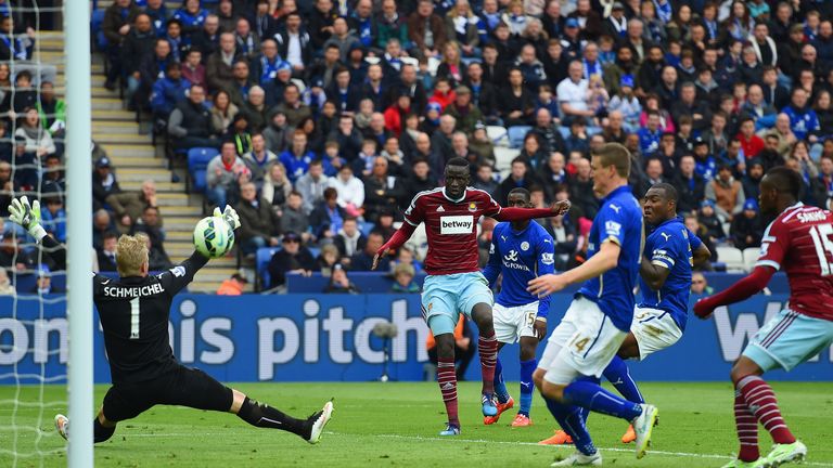 Cheikhou Kouyate of West Ham scores their first goal past Kasper Schmeichel of Leicester City