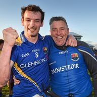 Longford midfielder Barry Gilleran celebrates with his manager Jack Sheedy after the final whistle