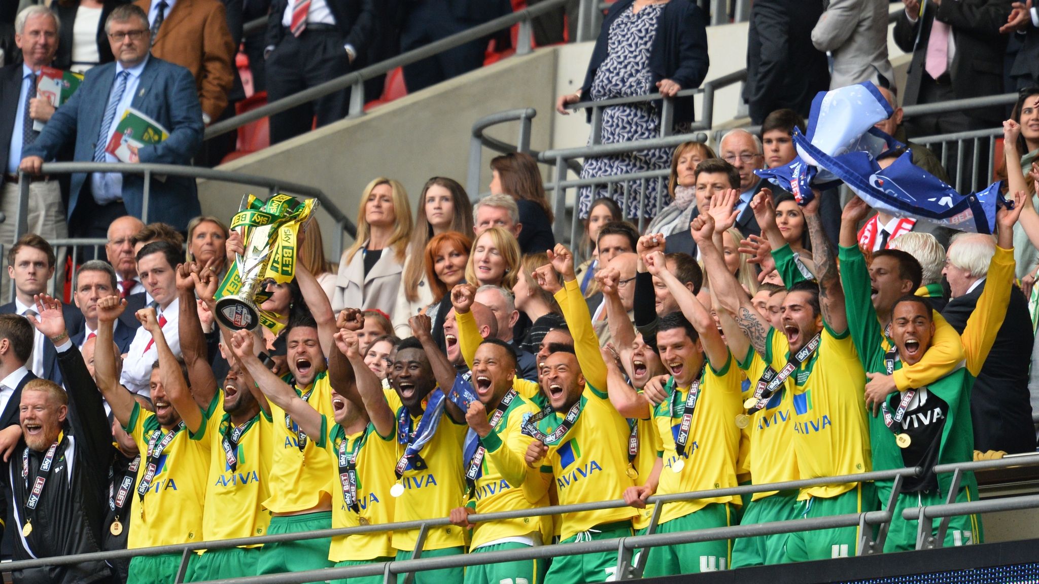 Russell Martin of Norwich City goes into the crowd to give his