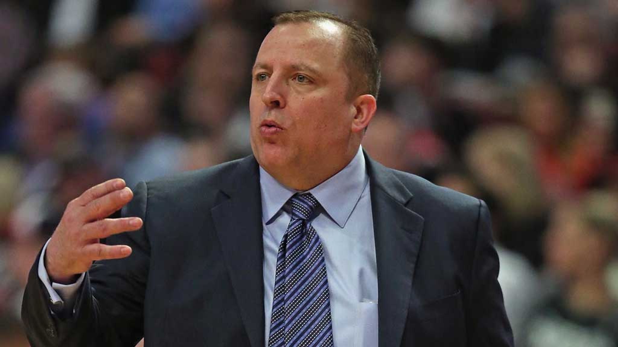 Chicago Bulls head coach Tom Thibodeau stands on the court in the
