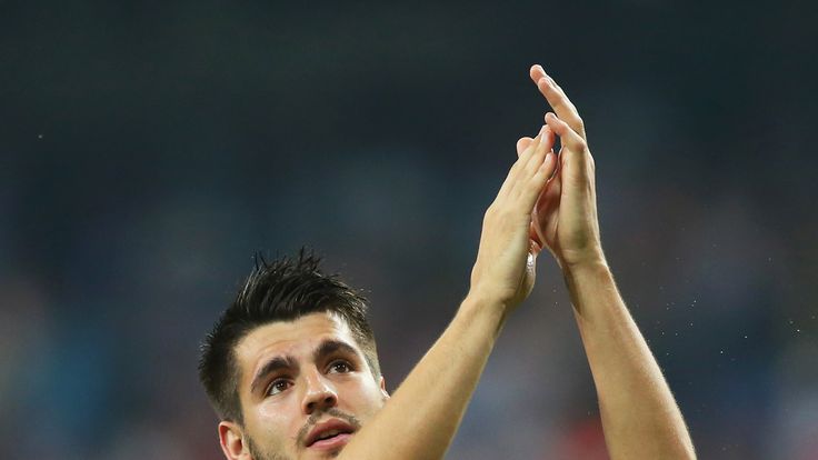 Alvaro Morata applauds the fans following his team's progression to the Champions League final