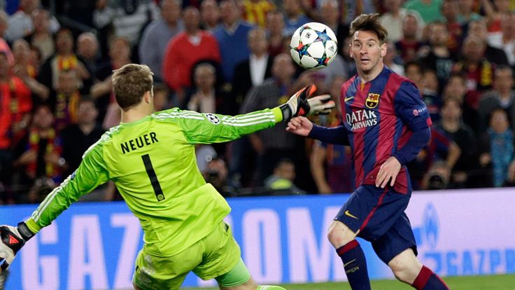 Barcelona's Lionel Messi, right, scores his second goal past Bayern's goalkeeper Manuel Neuer