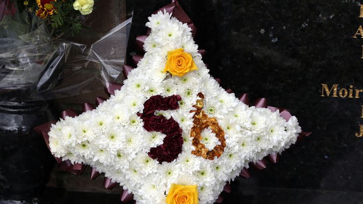 Floral tributes are laid at the Valley Parade Fire Memorial on the 30th  anniversary of the fire at the game between Bradford City and Lincoln City
