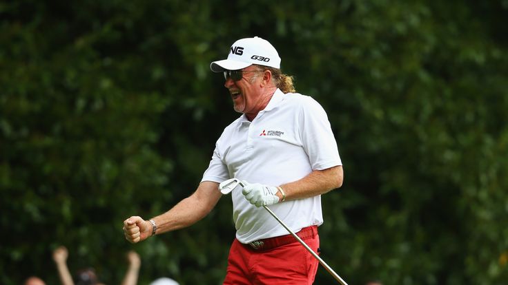 Miguel Angel Jimenez celebrates his hole-in-one on the 2nd hole during day 3 of the BMW PGA Championship at Wentworth