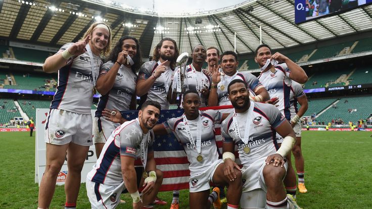 The USA team celebrate with the Cup after winning the Cup Final match between Australia and USA in the London Sevens