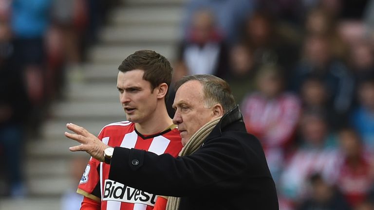 Manager Dick Advocaat of Sunderland speaks to Adam Johnson 
