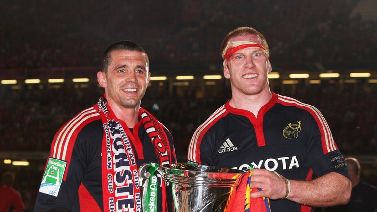 Alan Quinlan and Paul O'Connell celebrate with the trophy following victory in the Heineken Cup Final