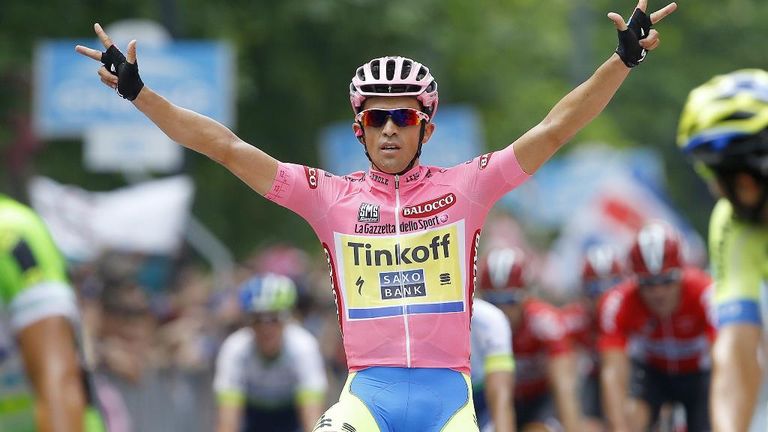 Alberto Contador celebrated as he crossed the finish line in Milan