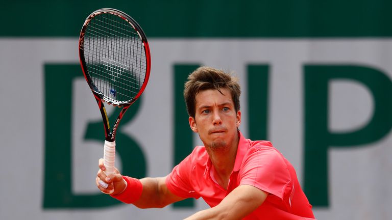 Aljaz Bedene of Great Britain in action in his Men's Singles match against Dominic Thiem of Austria on day two of the 2015 French Open