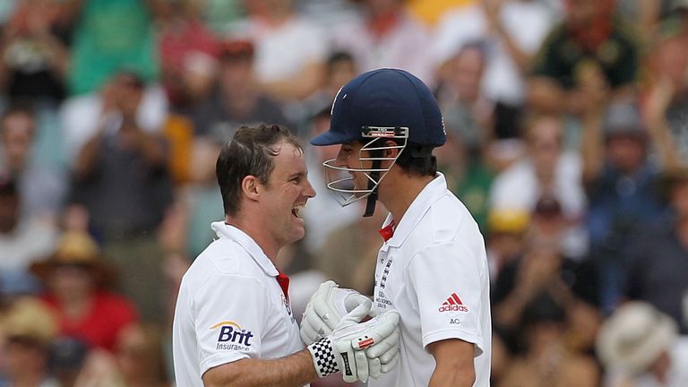 BRISBANE, AUSTRALIA - NOVEMBER 28:  Andrew Strauss (L) of England is congratulated by team mate Alastair Cook on his century during day four of the First A