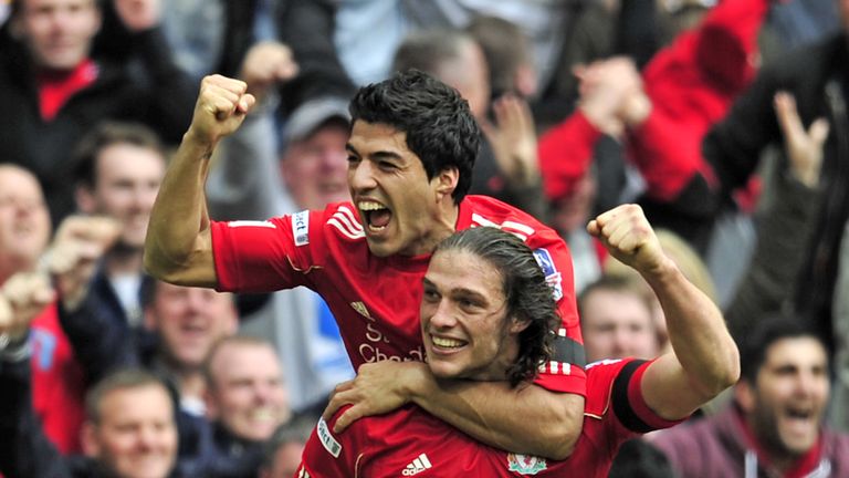 Liverpool's Andy Carroll celebrates with team-mate Luis Suarez after scoring the winning goal of the FA Cup semi-final against Everton in 2012