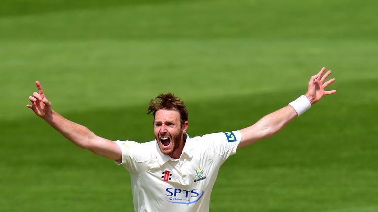 Andy Carter celebrates one of his 12 wickets for Glamorgan