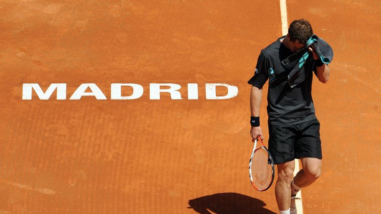 British Andy Murray wipes his face with a towel during his match against Spanish Tommy Robredo at the ATP Madrid Open claycourt tournament on May 14, 2009.