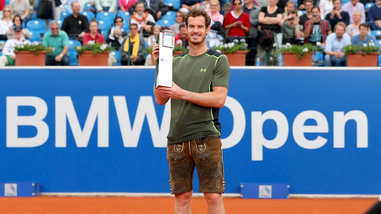 Andy Murray poses in a traditional bavarain Lederhosen after winning the BMW Open in Munich