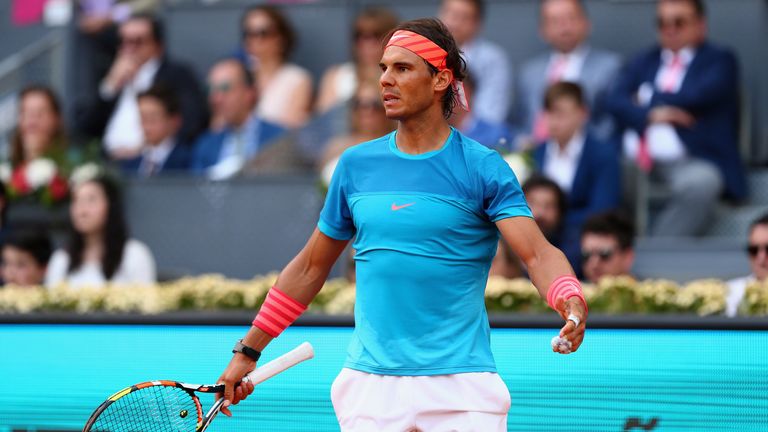 Rafael Nadal of Spain  plays shows his frustration against  Andy Murray of Great Britain in the mens final during day nine of the Mutua Madrid Open