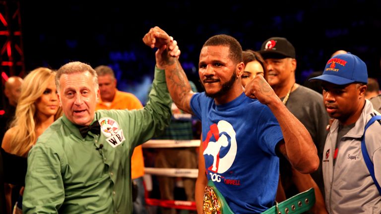 LOS ANGELES, CA - AUGUST 16:   Anthony Dirrell poses with his belt and referee Jack Reiss after winning a decision against Sakio Bika in their WBC Super Mi