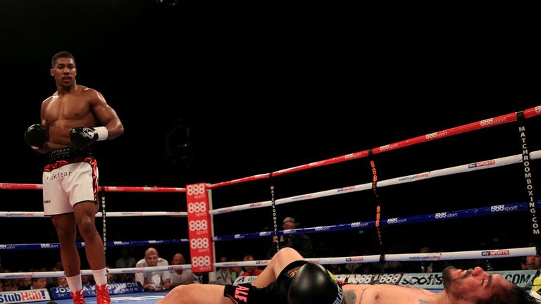 Anthony Joshua (left) in action against Rafael Zumbano Love during their Heavyweight bout at the Barclaycard Arena, Birmingham. PRESS ASSOCIATION Photo. Pi