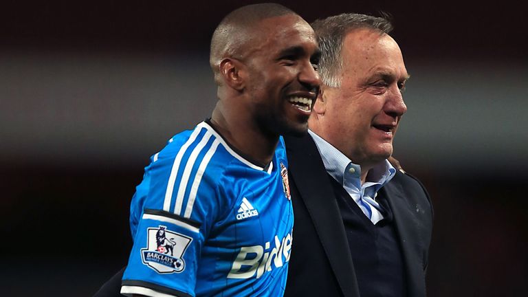 Sunderland's Jermaine Defoe (left) and Sunderland manager Dick Advocate (right) after the Barclays Premier League match at the Emirates Stadium, London. 