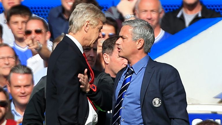 Chelsea manager Jose Mourinho (right) has a heated exchange with Arsenal manager Arsene Wenger in 2014