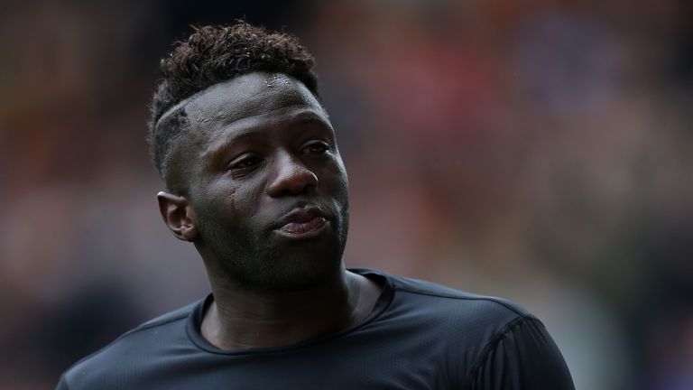 WOLVERHAMPTON, ENGLAND - MAY 02:  A tearful Bakary Sako makes his way off the pitch following the Sky Bet Championship match between Wolverhampton Wanderer