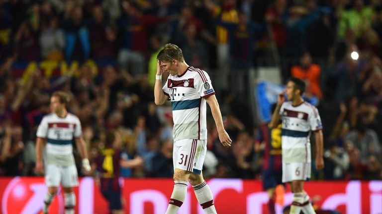 Bastian Schweinsteiger of Bayern Muenchen reacts after his team concede two second half goals against Barcelona
