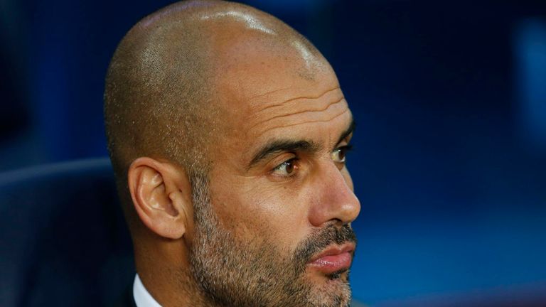 Bayern's head coach Pep Guardiola waits for the beginning of the Champions League semifinal first leg soccer match between Barcelona and Bayern Munich