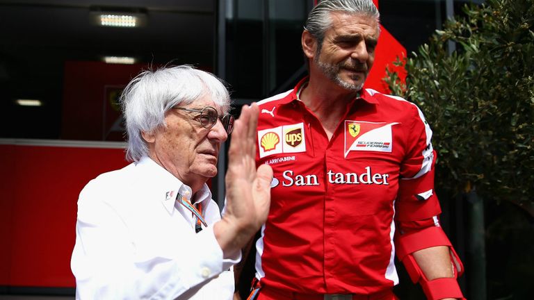 Bernie Ecclestone and Ferrari team boss Maurizio Arrivabene