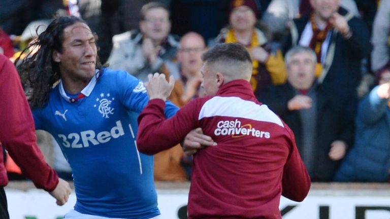 Rangers' Bilel Mohsni (centre) clashes with Motherwell players