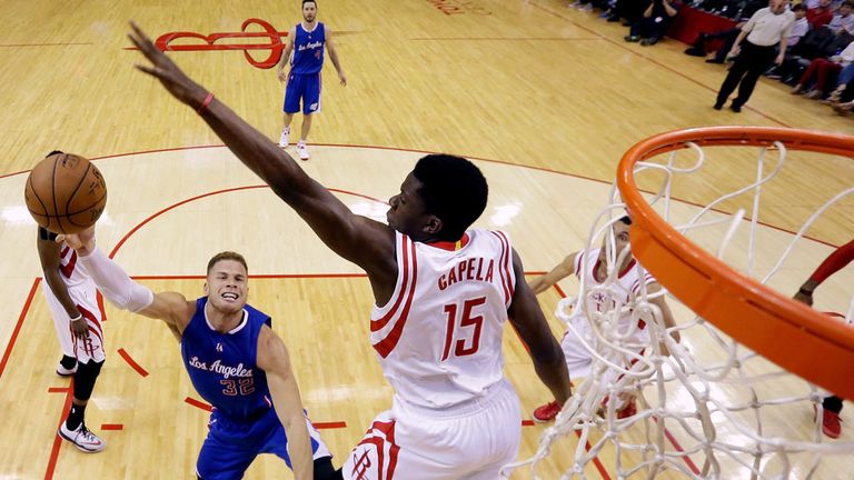 Blake Griffin shoots past Clint Capela as the LA Clippers take on the Houston Rockets
