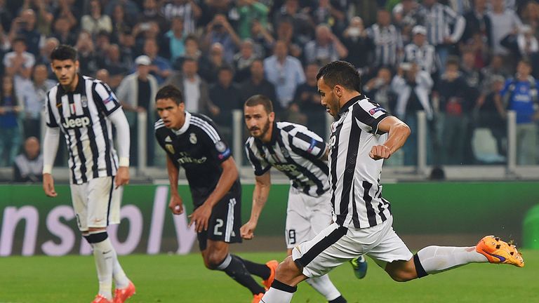 Carlos Tevez of Juventus scores from the penalty spot