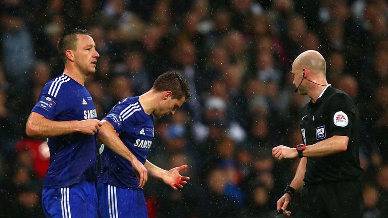 Azpilicueta played on after a bloody collision against Tottenham