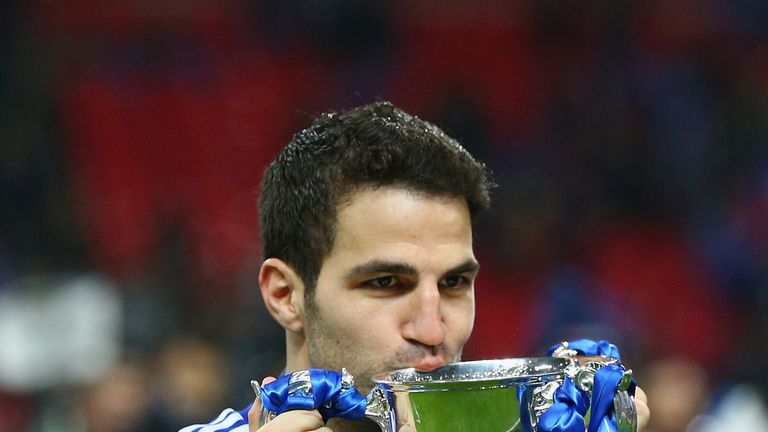 LONDON, ENGLAND - MARCH 01:  Cesc Fabregas of Chelsea poses with the trophy during the Capital One Cup Final match between Chelsea and Tottenham Hotspur at