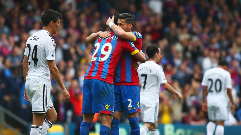 Marouane Chamakh of Crystal Palace celebrates scoring his team's first goal with his team mate Joel Ward