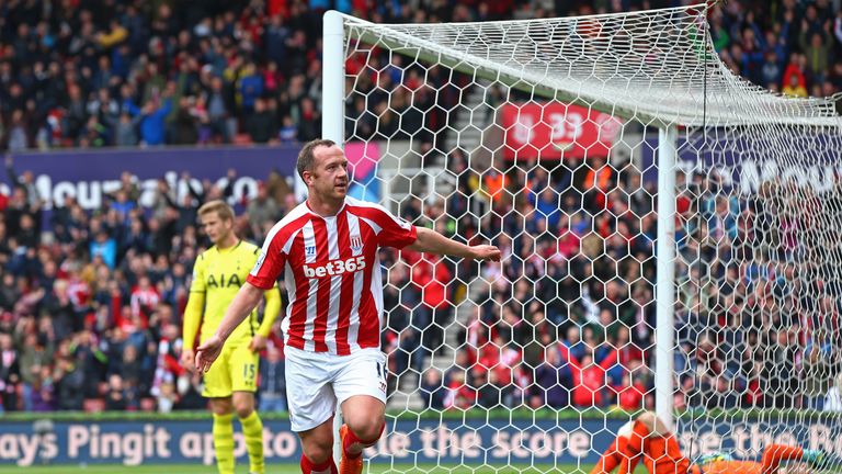 Charlie Adam scores past Hugo Loris at the Britannia Stadium as Stoke go 1-0 up against Tottenham