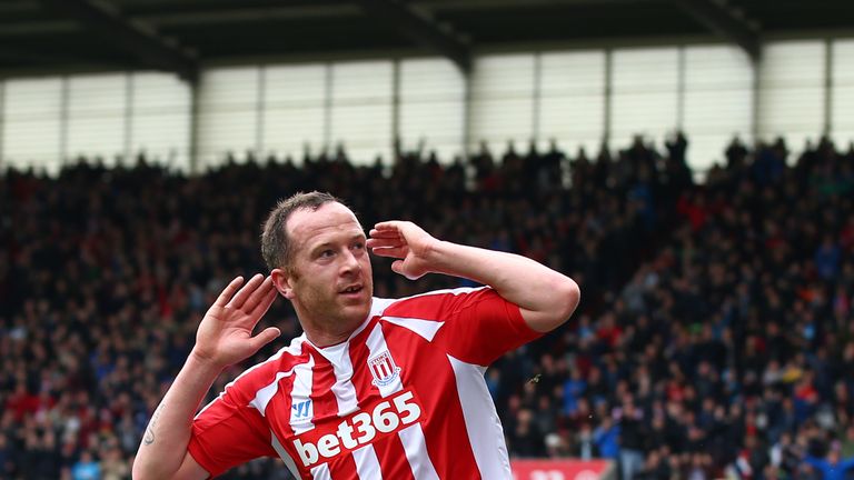 Charlie Adam seems to be having trouble hearing the Spurs fans after putting Stoke into the lead