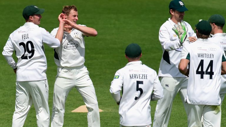 Worcestershire bowler Charlie Morris (c) celebrates with team mates after dismissing Somerset batsman Jim Allenby