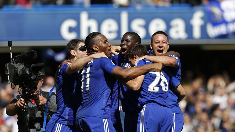 Chelsea players celebrate their title triumph after the final whistle against Crystal Palace