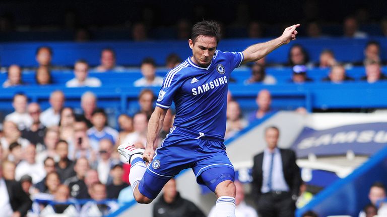 Chelsea's English midfielder Frank Lampard scores his team's second goal with a free kick during the English Premier League football match between Chelsea 