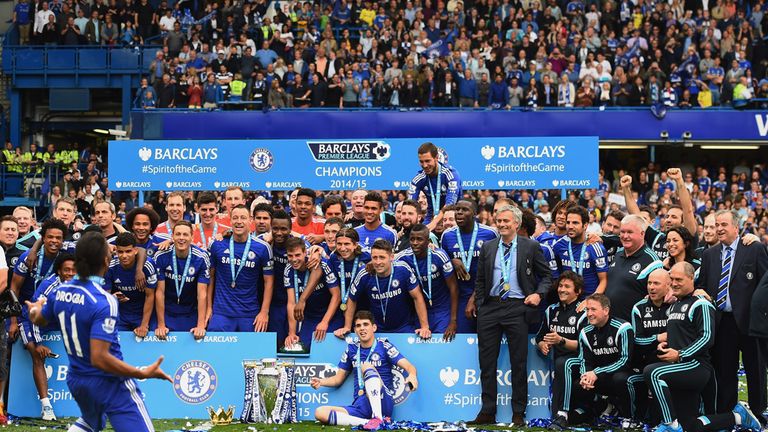 Didier Drogba and Chelsea players and staffs celebrate winning the Premier League