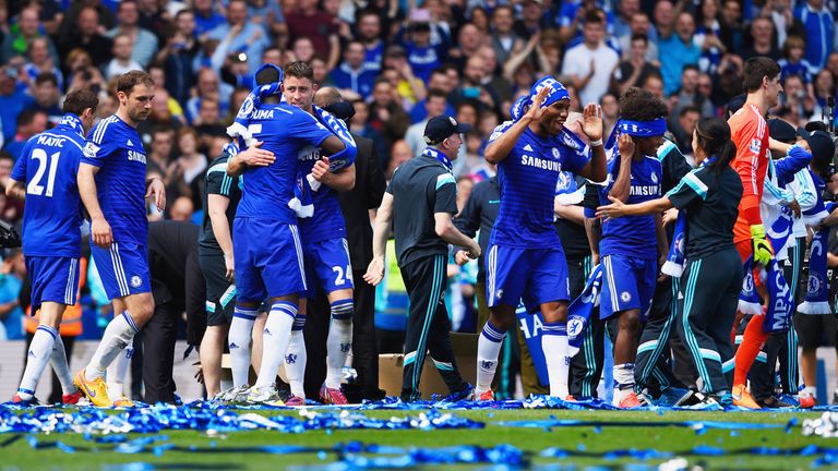 Chelsea players and staff celebrate winning the Premier League title